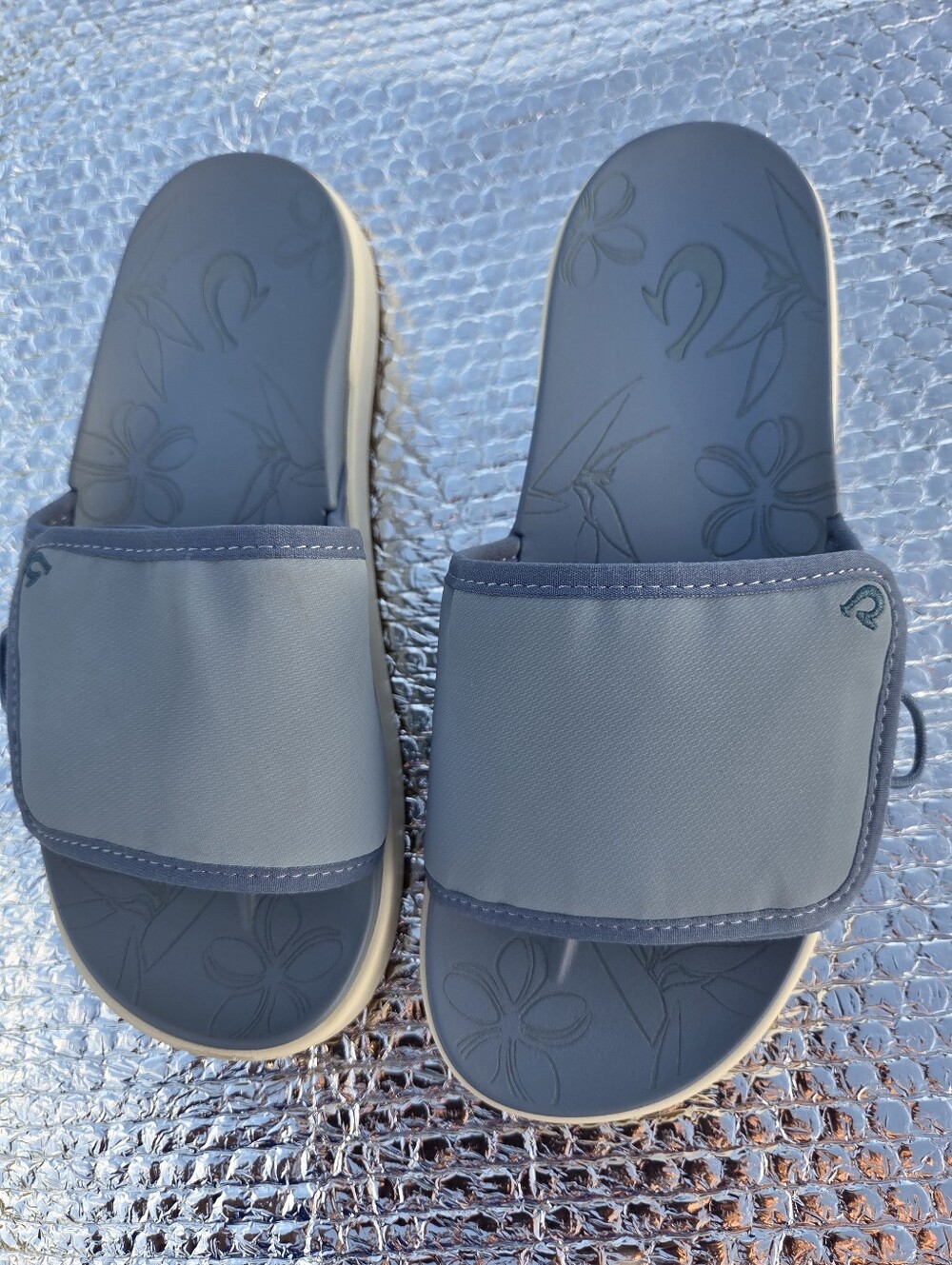 OluKai Nu'a Olu Women's Slide Sandals with Embossed Floral Footbed